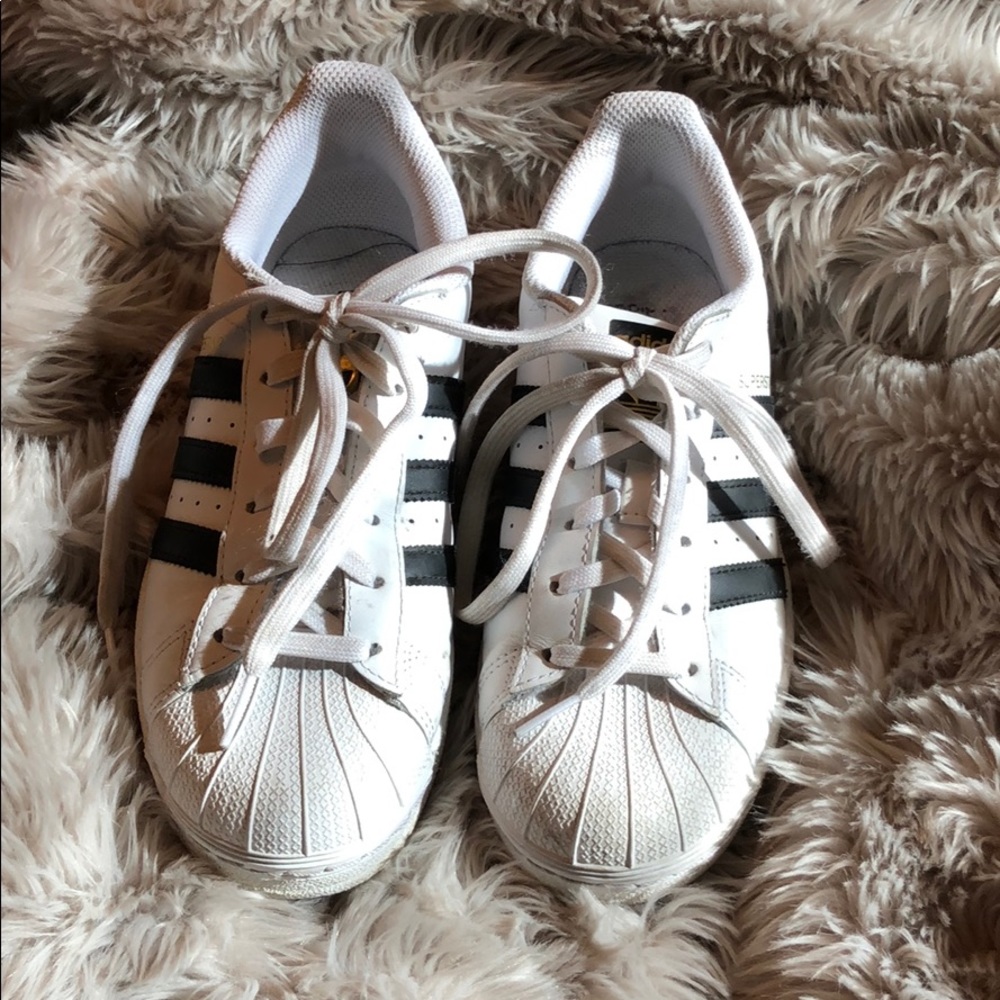 White Adidas Superstars